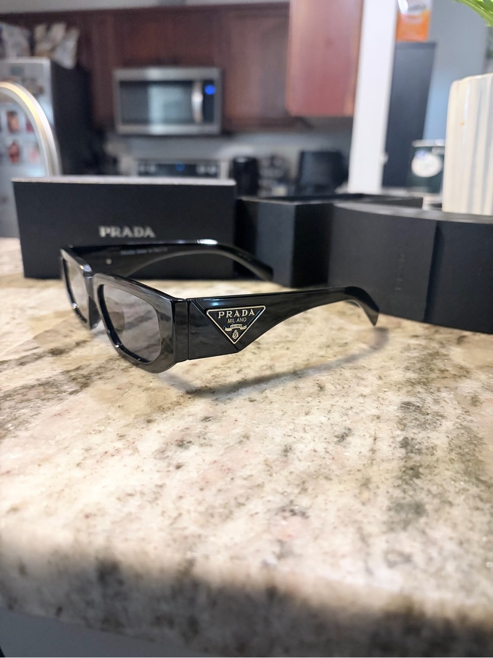 Prada Glossy Black Triangle-Logo Sunglasses